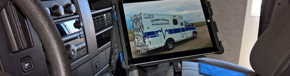 An ambulance interior with a vehicle mounted tablet case