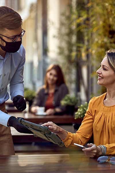 woman ordering food on rugged tablet