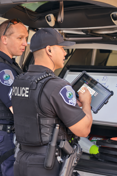 police officers using rugged surface tablet