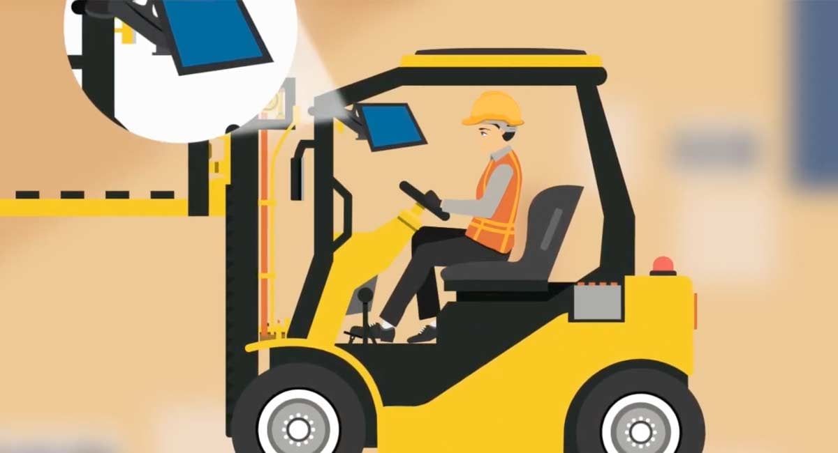 Still frame from the video of a forklift driver in animated style