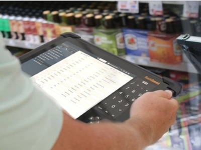 Person holding rugged tablets