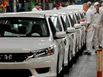 Honda cars lined up in manufacturing line
