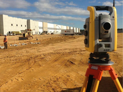 ground surveying equipment in construction zone