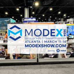MODEX 2024 logo over image of MobileDemand team in booth