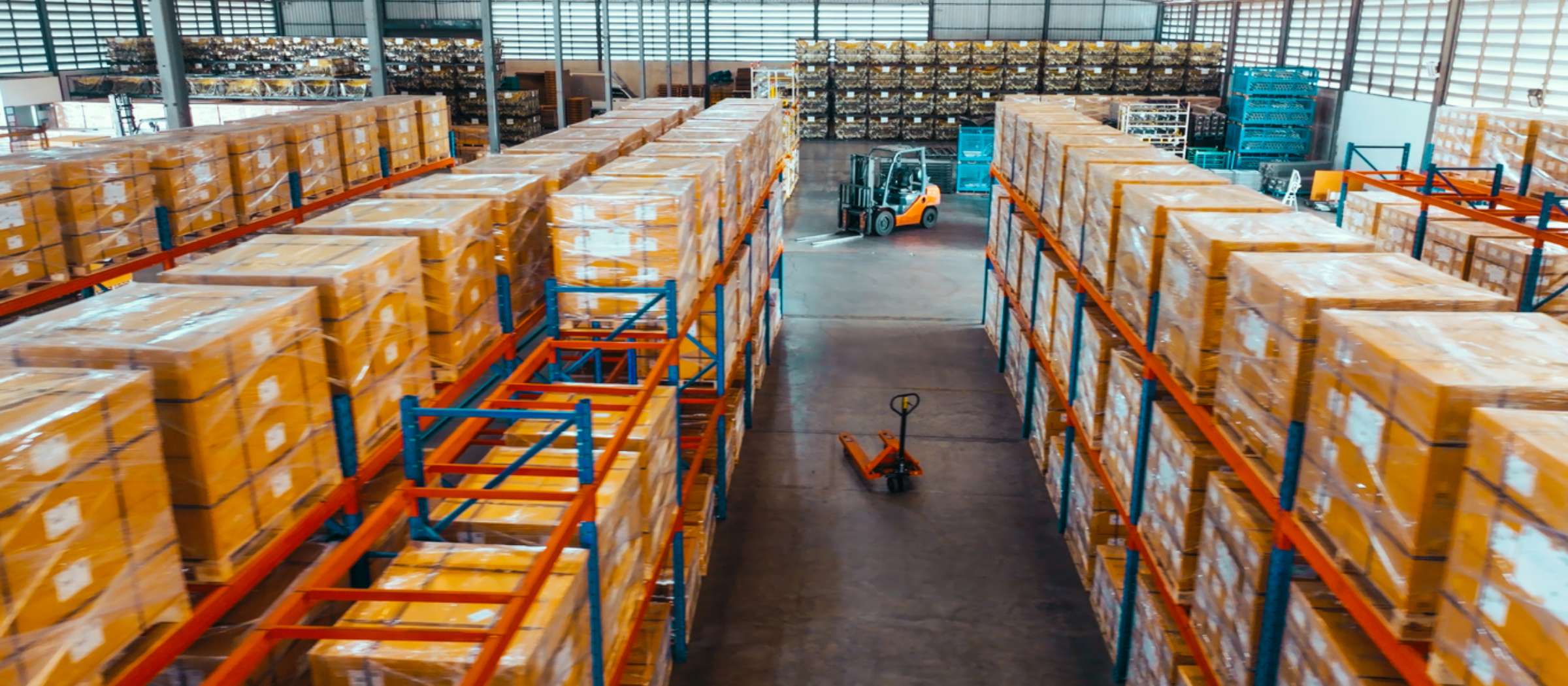 a large warehouse with forklift