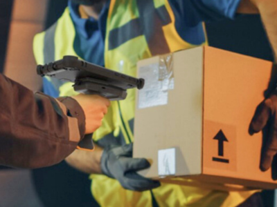 worker scanning box for delivery